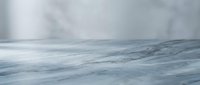 Dramatic stormy seascape with turbulent gray ocean waves under overcast cloudy sky creating moody atmospheric marine environment for weather concepts.
