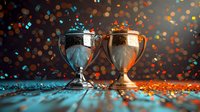 Silver and gold trophy cups on dark background with dramatic lighting and glitter bokeh effects creating competitive sports atmosphere and celebration mood.