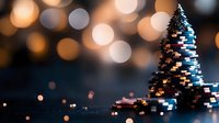 Glowing spiral Christmas tree with metallic geometric design against blurred golden bokeh lights creating magical holiday atmosphere and festive mood.
