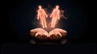 Glowing human figures floating above open cupped hands against dark background representing spiritual connection, energy healing and metaphysical concepts.