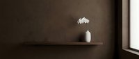 Minimalist interior with white dried flowers in ceramic vase on wooden floating shelf against dark brown wall, modern home decor and design inspiration.
