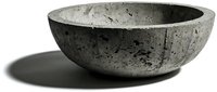 Rustic concrete bowl with rough textured surface casting a natural shadow, isolated on white background, ready for design use.