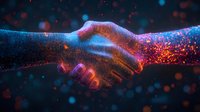 Glowing handshake silhouette with luminous particles in dark blue and orange colors symbolizing digital transformation, business agreement and partnership.