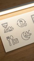 Sustainable business icons drawn on paper featuring eco-friendly symbols for environmental corporate branding and green marketing materials.