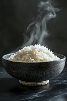 Steaming white rice in rustic ceramic bowl against dark background, elegant food photography for culinary publications.