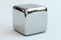 Shiny chrome metal cube with reflective surface isolated on white background for modern design and industrial applications.