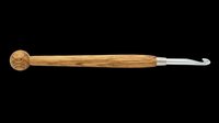 Wooden crochet hook with metal tip, isolated on transparent background, ready for crafting, knitting, and needlework clipart, stickers, print on demand, and t-shirt design use.