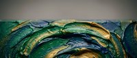 Abstract acrylic paint strokes in green, blue and gold creating textured artistic background for creative projects and modern design applications.