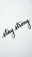 Stay strong motivational text written in black handwriting on white paper background, isolated and ready for design use on apparel and marketing materials.