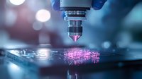 Microscope laser scanning biological sample with pink fluorescent glow effect on dark background, scientific research laboratory equipment in action.