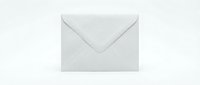 Closed white envelope with triangular flap on neutral background, suitable for mail, correspondence, and business communication concepts.