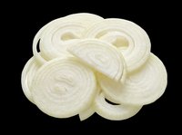 Sliced white onion rings isolated on transparent background, ready for culinary design, food packaging, recipe graphics, cooking blogs, restaurant menus, and print-on-demand products.