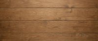 Natural brown wooden planks background with horizontal grain pattern for rustic interior design and construction projects.