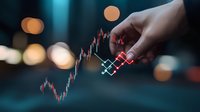 Hand drawing financial candlestick chart pattern with glowing red and white lines on dark background with bokeh lights. Market analysis concept.