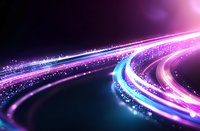 Glowing curved light trails with sparkling particles in motion against dark background, featuring vibrant pink, purple and blue neon colors. Dynamic energy flow concept.