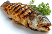 Grilled whole mackerel with crispy charred skin and fresh parsley garnish on white background, showcasing traditional seafood preparation and cooking technique.