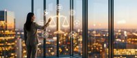Professional businesswoman using digital interface with legal scales icons in modern office overlooking city skyline at sunset for corporate presentations.