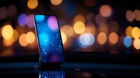 Modern smartphone displaying cosmic galaxy screen against blurred bokeh lights background creating magical atmospheric mood for technology concepts.