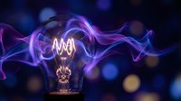 Glowing light bulb with purple and blue energy waves flowing around it against dark bokeh background representing innovation and creative ideas.