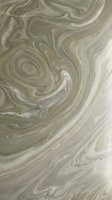Abstract fluid marble texture with swirling green and cream patterns creating organic flowing movement for modern design backgrounds and artistic projects.