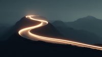 Winding mountain road with glowing light trails at dusk creating dramatic curves through silhouetted peaks in moody atmospheric landscape for travel concepts.