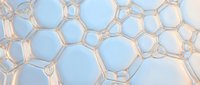 Abstract hexagonal molecular structure with golden metallic framework on soft blue gradient background for science and technology concepts.