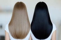 Two women showing long straight hair from behind, blonde and black colored, demonstrating hair care results and styling comparison on light background.