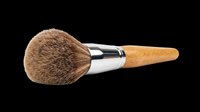 Makeup powder brush with wooden handle and soft bristles, isolated on transparent background. Ready for beauty clipart, stickers, t-shirt design, and print on demand use.