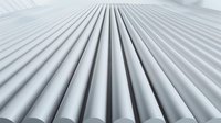 Abstract geometric pattern of parallel white cylindrical tubes extending to vanishing point creating modern minimalist architectural background with light and shadow.