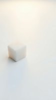 Single white sugar cube isolated on neutral background, ready for design use in food, beverage, and culinary projects.