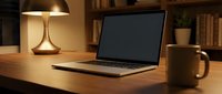 Laptop with blank screen on wooden desk beside brass lamp and coffee mug in home office workspace for remote work and business projects.