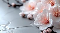Delicate pink cherry blossoms with soft petals against gray textured background, creating romantic spring atmosphere for wedding and celebration designs.