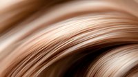 Smooth flowing curves in warm brown and beige tones create elegant abstract background with soft gradient transitions and silky texture. For luxury branding designs.
