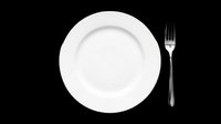 White ceramic dinner plate with silver fork, isolated on transparent background, ready for restaurant menus, stickers, print on demand, and T-shirt design use.