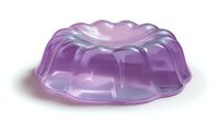 Translucent jelly dessert in bundt cake shape with purple and blue gradient coloring on white background, isolated food object for culinary designs.