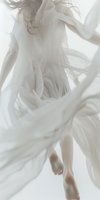 Woman in flowing white sheer fabric dancing or moving gracefully against bright background. Isolated figure with billowing translucent material, suitable for fashion, beauty, wellness and editorial design projects.
