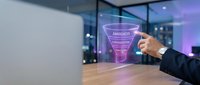 Businessman hand touching holographic awareness funnel diagram in modern office environment for marketing strategy and customer journey visualization.