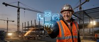 Construction worker in orange safety vest and hard hat gesturing toward holographic digital icons above palm, representing communication and technology integration on active building site at dusk.
