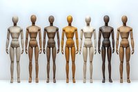 Wooden mannequins representing diverse skin tones stand in row showing racial equality and inclusion concept. Artistic display of unity in diversity.