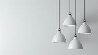 White dome pendant lights hanging from chrome fixtures against neutral gray background, minimalist contemporary interior design elements for modern spaces.