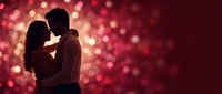 Romantic couple silhouette embracing against warm red bokeh lights background for Valentine's Day, anniversary celebrations and love concepts.