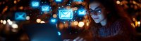 Young African American woman with glasses using digital device at night, surrounded by glowing blue email icons, depicting modern communication technology.