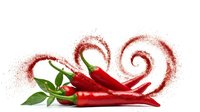 Fresh red chili peppers with green leaves creating spicy powder swirls on white background. Hot seasoning ingredient for cooking and culinary arts.