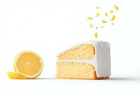 Slice of yellow layer cake with white frosting and floating lemon crescent shapes, accompanied by fresh cut lemon on white background, isolated food photography.