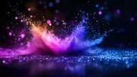 Colorful powder explosion with pink and blue particles creating magical dust cloud effect against dark background with glitter and bokeh reflections.