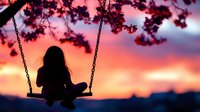 Silhouette of young girl on swing against dramatic sunset sky with cherry blossoms overhead, creating nostalgic childhood moment.