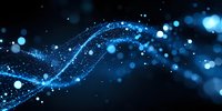 Abstract blue glowing particles flow with bokeh effect on dark background, creating dynamic wave motion for technology and science designs.