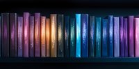 Row of colorful books arranged on dark shelf creating rainbow spectrum effect from purple through gold to blue and back to purple, dramatic lighting highlights spines.