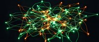 Abstract network visualization with glowing green and orange nodes connected by luminous lines on dark background for technology presentations.