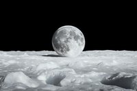 Full moon rising over lunar surface landscape with detailed craters and mountains in black and white monochrome composition against dark space background.